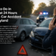 Man speaking on a phone beside damaged vehicles after a car accident in Maryland with police lights in the background.